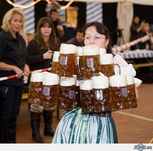 Click to Enlarge

Name: Oktoberfest-Waitress-serves-mugs-of-beer.jpg
Size: 271 KB