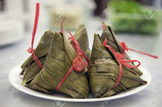 Click to Enlarge

Name: 26295576-Glutinous-Rice-Dumpling-Wrapped-in-Bamboo-or-Large-Flat-Leaves-Closeup-Stock-Photo.jpg
Size: 218 KB