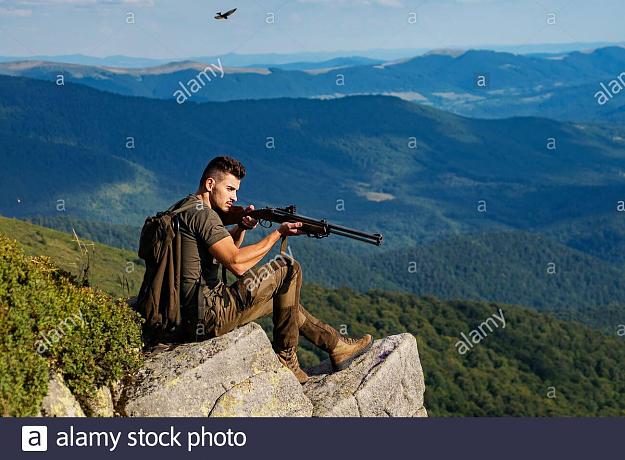 Click to Enlarge

Name: hunter-man-hunter-on-big-game-or-small-game-man-with-gun-hunter-target-with-laser-sight-hunter-e.jpg
Size: 147 KB