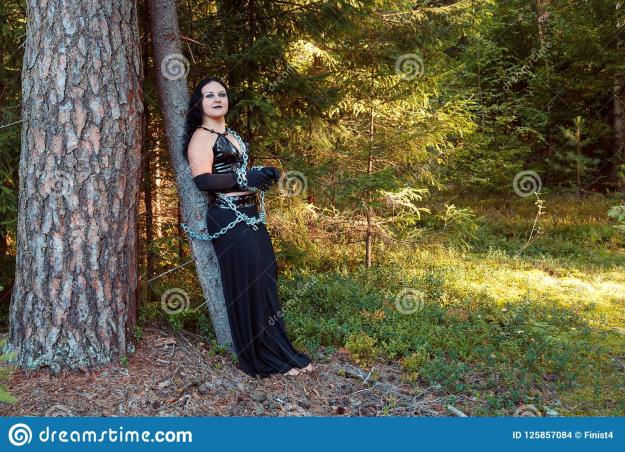 Click to Enlarge

Name: young-woman-witch-black-chained-to-tree-forest-halloween-horizontal-photo-125857084.jpg
Size: 482 KB